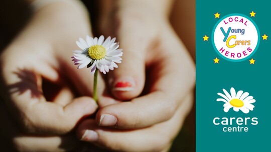 A pair of hands holding a daisy. On the right of the image is the Carers Centre logo and Young Carers Local Heroes logo.