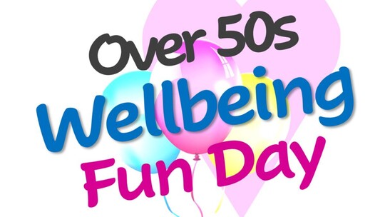 Text reads 'Over 50s Wellbeing Fun Day' on a background of pink and blue balloons
