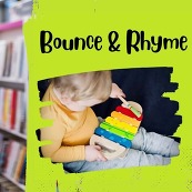 A young child plays with a rainbow coloured xylophone. Above the text reads: Bounce and Rhyme in curly letters.