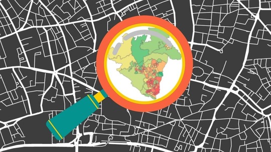 A black and white map, over which a magnifying glass frames the outline of the Borough of Telford & Wrekin