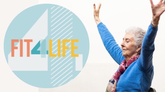An older woman sitting in a chair stretching her arms over her head. To the left of her is the Fit4All logo.