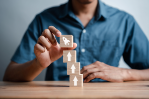 Wooden building blocks with arrows