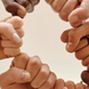 Hands making a fist in a circle