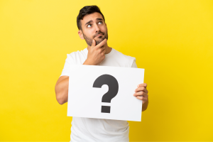 man holding a question mark 