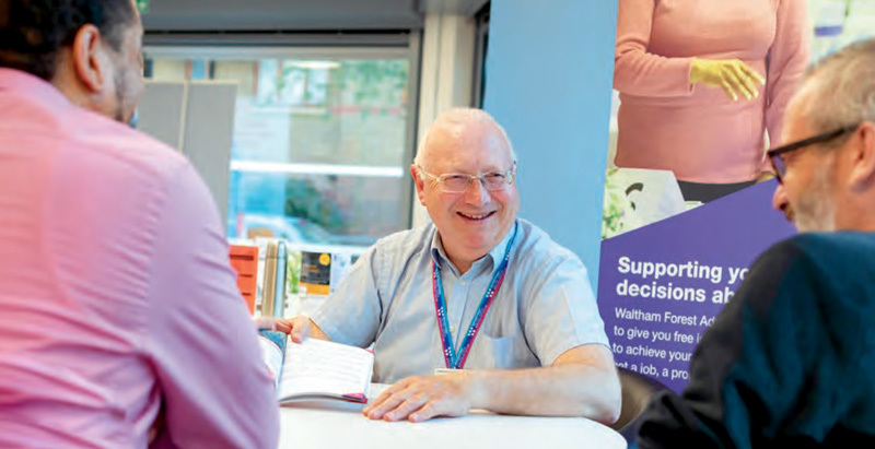 Information, advice and guidance: one of our Adult Learning Service team discussing our courses