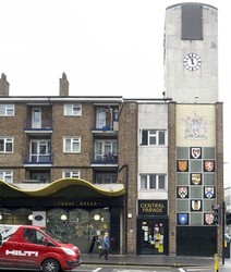 Central Parade clock tower with heraldic shields