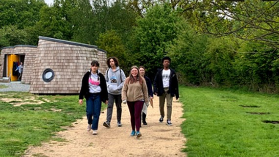 Suntrap young people near pods