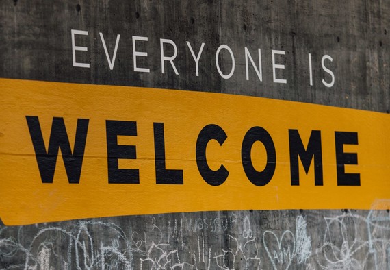 Everyone is welcome painted on a wall. Photo: Katie Moum/Unsplash 