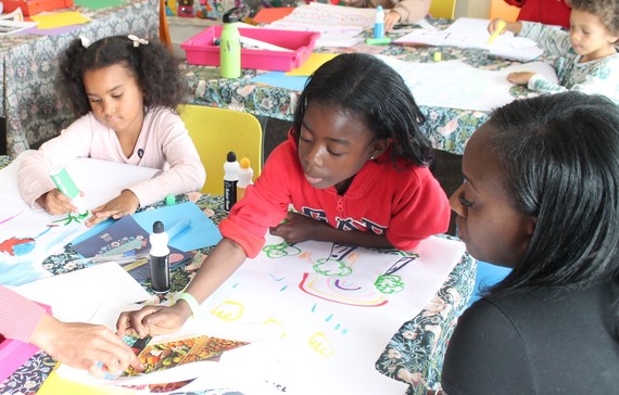 Children take part in a family art day at William Morris Gallery