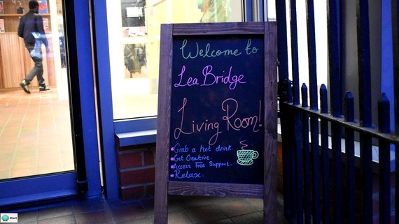 Sign outside saying: Welcome to Lea Bridge Living Room: grab a hot drink, get creative, access free support, relax