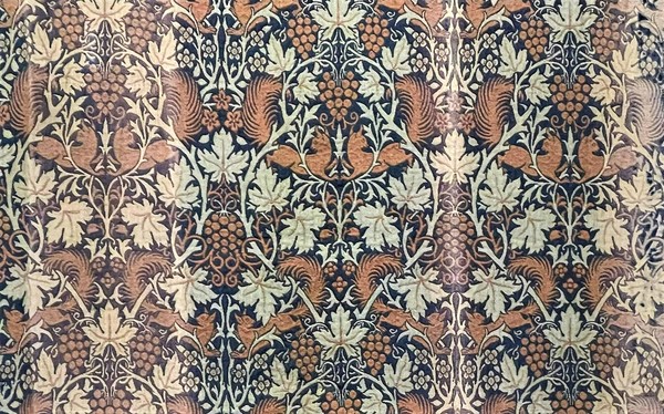 Curtain fabric featuring squirrels and vines