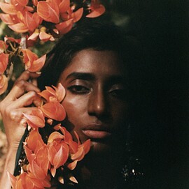 Ashish Shah photographic portrait of woman with flowers