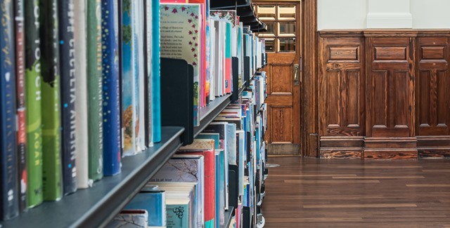 Close up on books on a shelf in Walthamstow Library