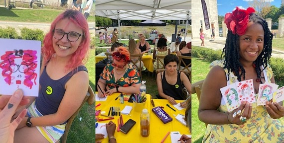 Two adults are sketching while two other adults hold up sketches they have already made either side of them