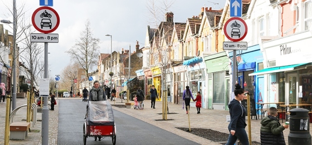 People and cyclists on Francis Road, Leyton