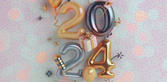 2024 spelt out in shiny metallic balloons