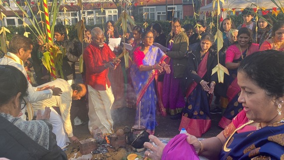 A group of residents wearing traditional dress celebrate Tamil Heritage month