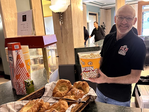 Gentleman with popcorn at fellowship square