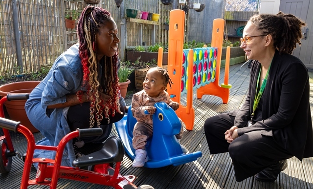 Cllr Kizzy Gardener meets a parent and child at Leyton Family Hub