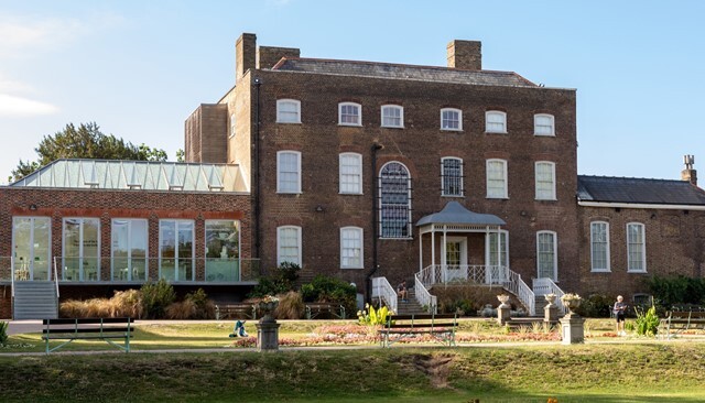 The exterior of the back of William Morris Gallery showing Deeney's cafe and the verandah