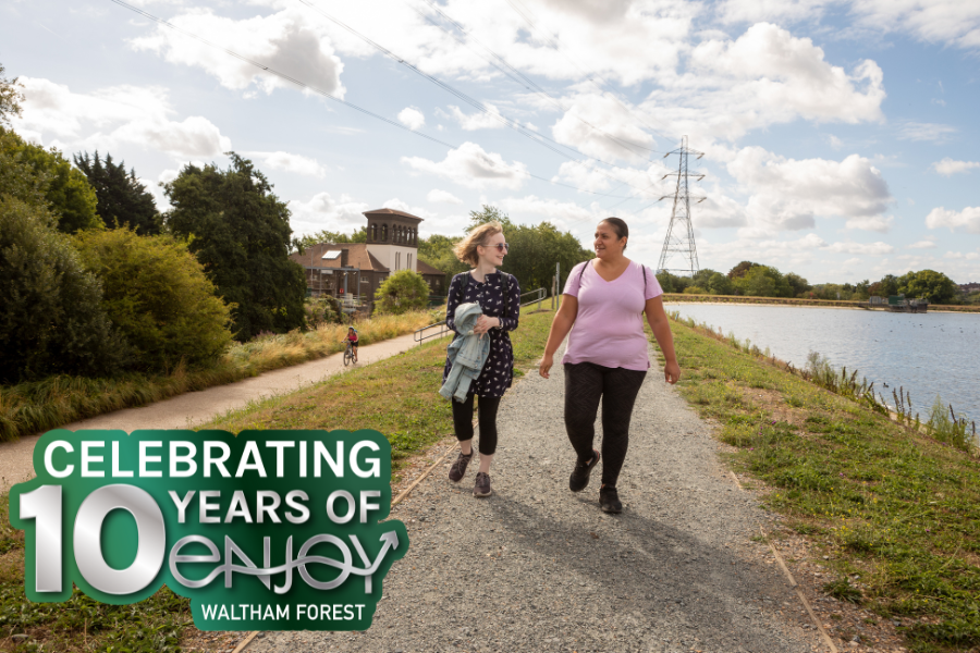 Photo of two women walking in the Walthamstow Wetlands