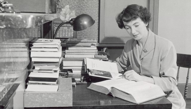 Black and white image from 1950 of a female librarian at Leyton Library