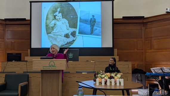 A photo of Joan Salter MBE speaking in the council chambers
