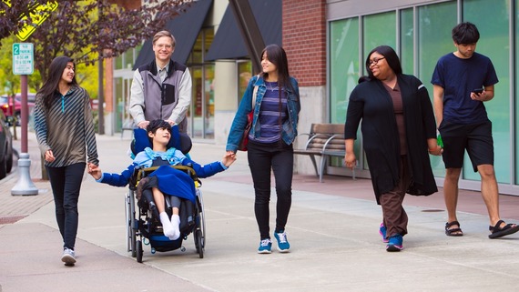 a photo of a young man with his carers
