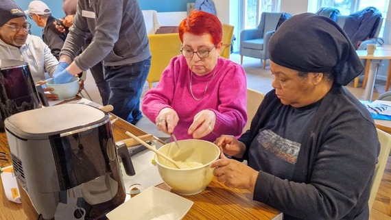 a photo of people enjoying an air-fryer cooking class