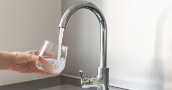 a photo of a tap with running water