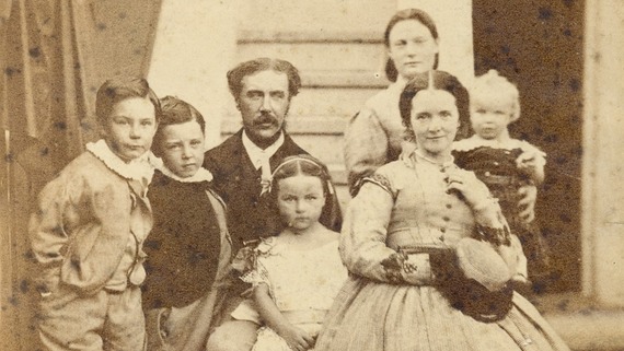 An old-timey portrait of a family posing