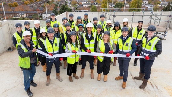 A photo of a group of people atop Priory Court estate