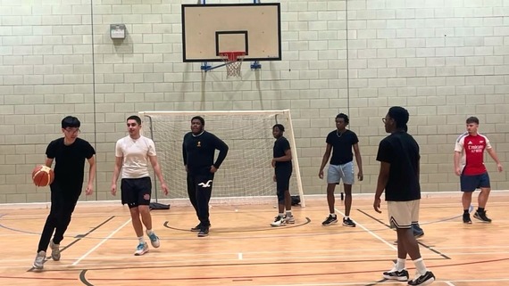 Space4All a photo of some kids playing basketball