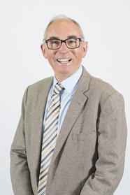 Headshot of Councillor Giles Archibald smiling