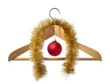 Christmas wooden coat hanger with tinsel and a bauble