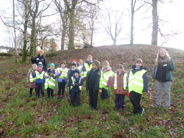 Pupils from St Martin and St Mary Church of England Primary School with Cumbria Wildlife Trust Pollinator Conservation Officers.