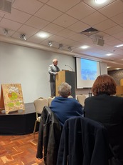 Cllr Giles Archibald speaking at a Climate Conversation event