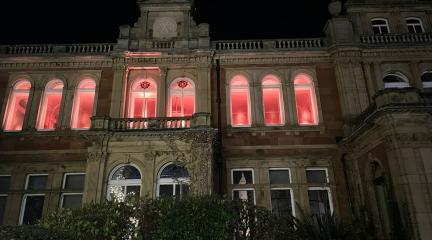 Penrith town hall lit up in orange