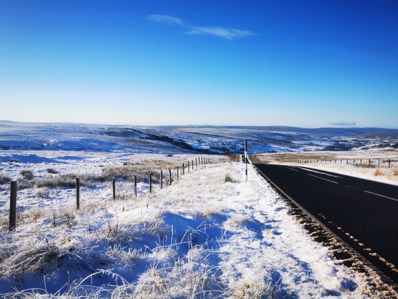 Snowy roadside view of Hartside Pass 