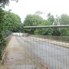 Closure fencing bent and cut 