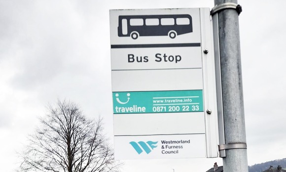 Westmorland and Furness Council bus stop sign on a road