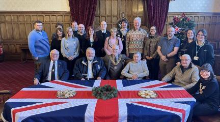 Veterans gather at town hall for festive thank you 