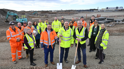 Representatives of Westmorland and Furness Council, Homes England, Redstart Northwest Ltd and Team Barrow at the Marina Village site