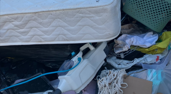 Some of the waste cleared from alleyways in Barrow including old mattresses and broken toys