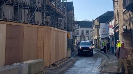 A car driving through Market Street