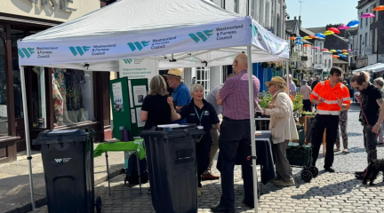 Residents chatting to the team at the Ulverston Market stall
