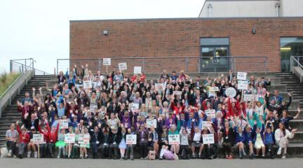 A group of students and teachers attending the Cumbria Youth Climate Summit at Furness Academy