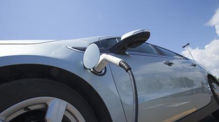 Electric car being charged