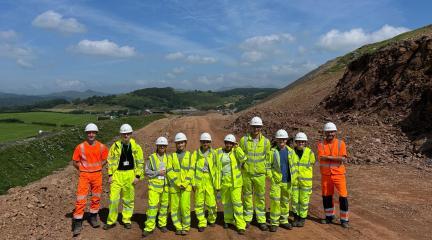Story Contracting and Westmorland and Furness project team stood in the middle of the new route