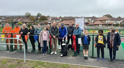 A group of people at the opening of the new Multi-Use Games Area at Carleton Park, Penrith